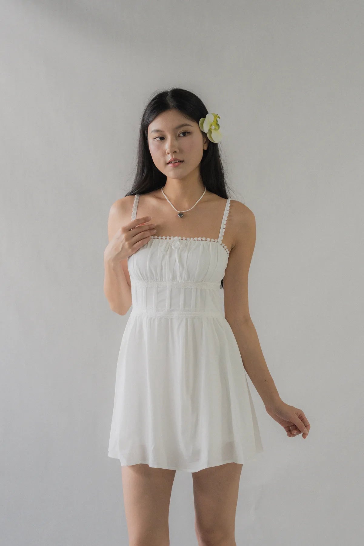 (Backorder) Elysia Ribbon Pintuck Padded Mini Romper Dress