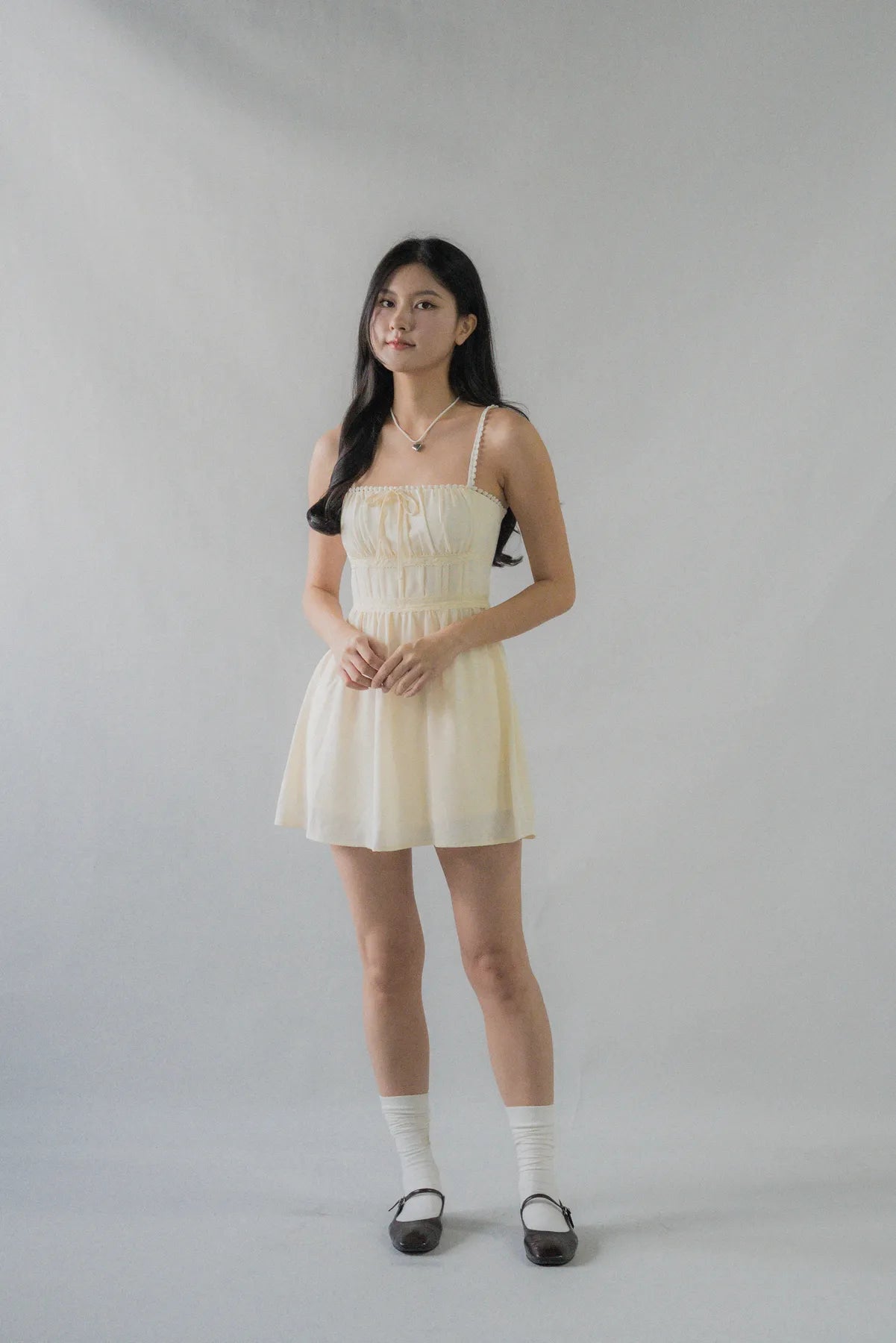 (Backorder) Elysia Ribbon Pintuck Padded Mini Romper Dress