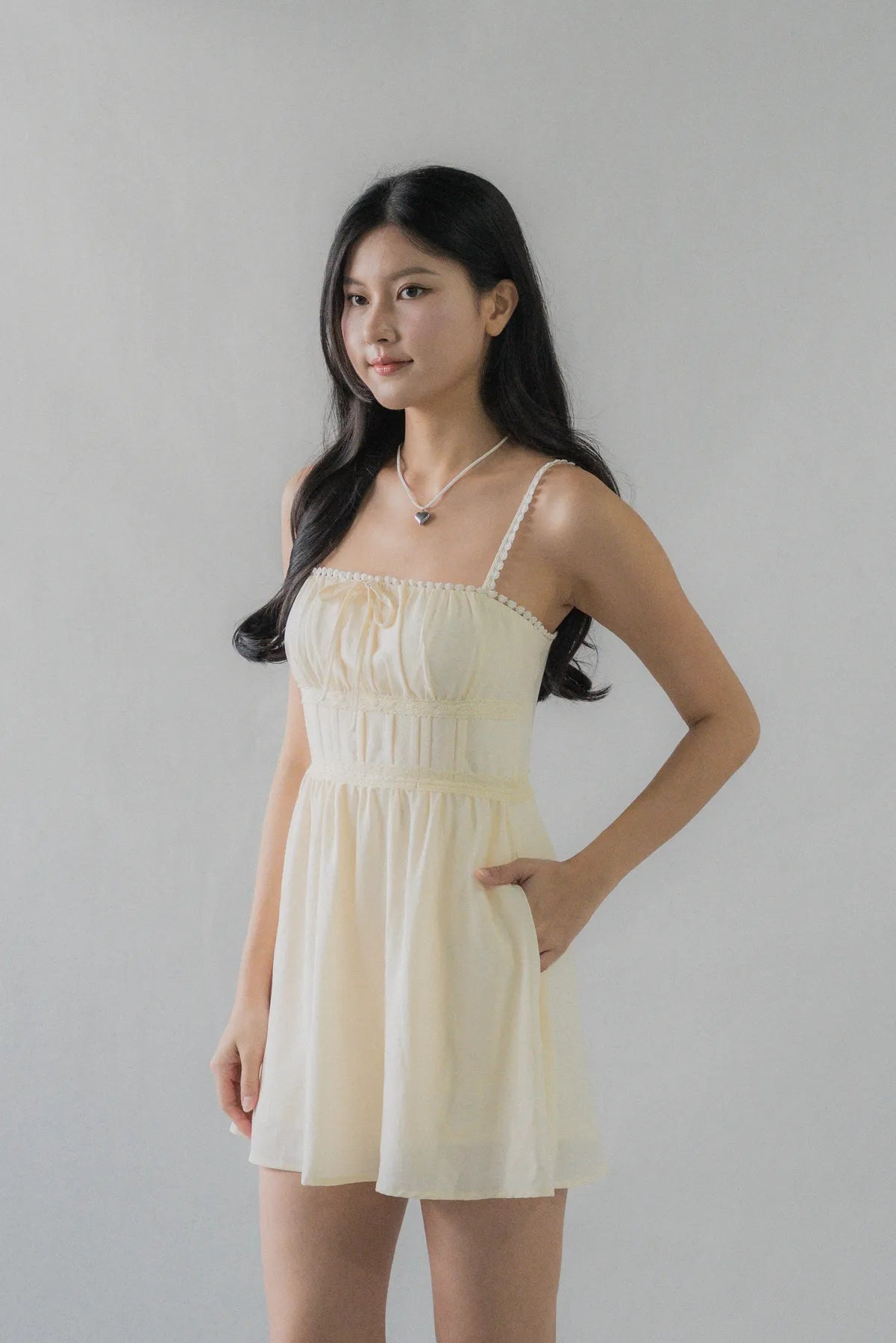 (Backorder) Elysia Ribbon Pintuck Padded Mini Romper Dress