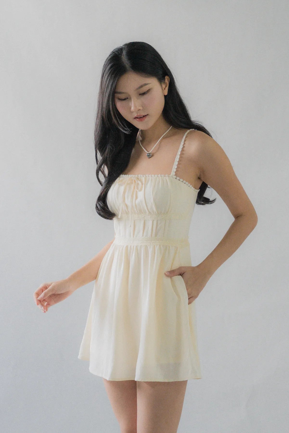 (Backorder) Elysia Ribbon Pintuck Padded Mini Romper Dress