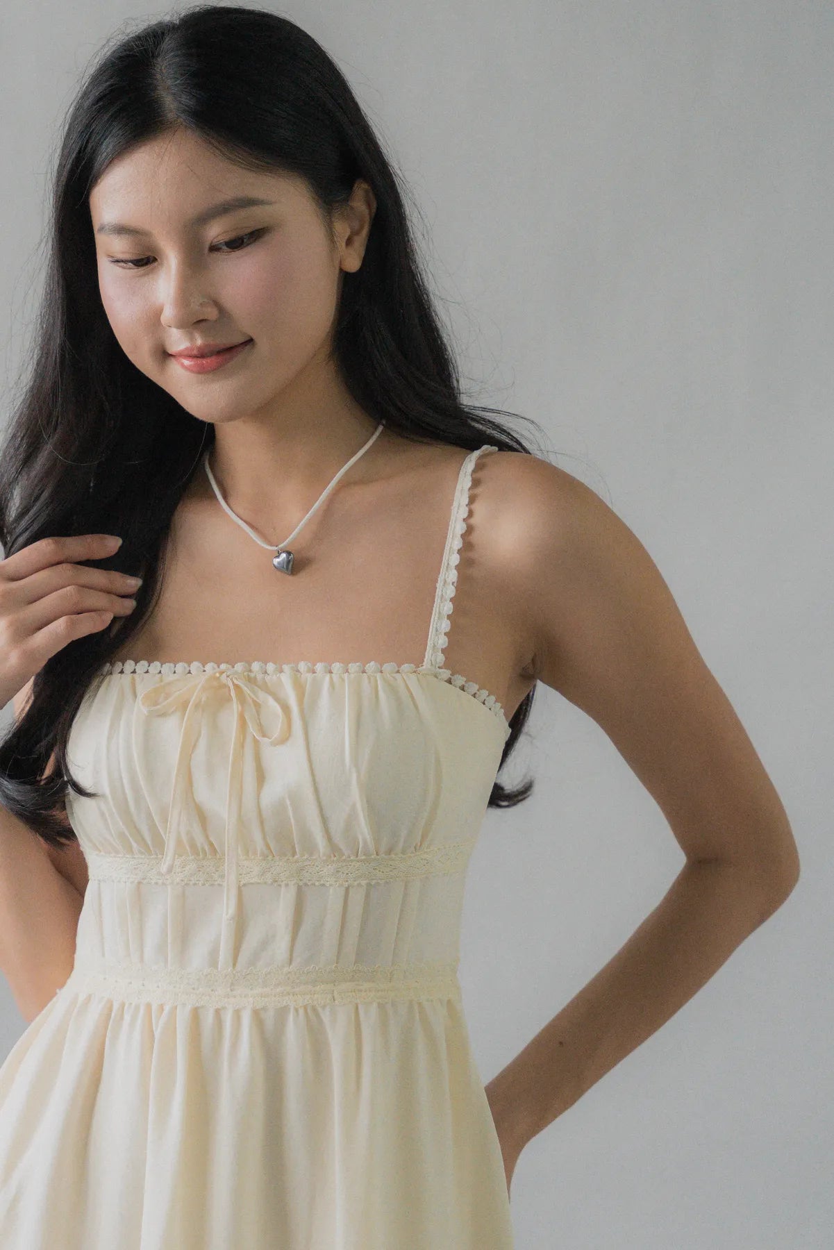 (Backorder) Elysia Ribbon Pintuck Padded Mini Romper Dress