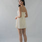 Elysia Ribbon Pintuck Padded Mini Romper Dress