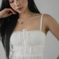 Ellie Ribbon Pintuck Padded Babydoll Top
