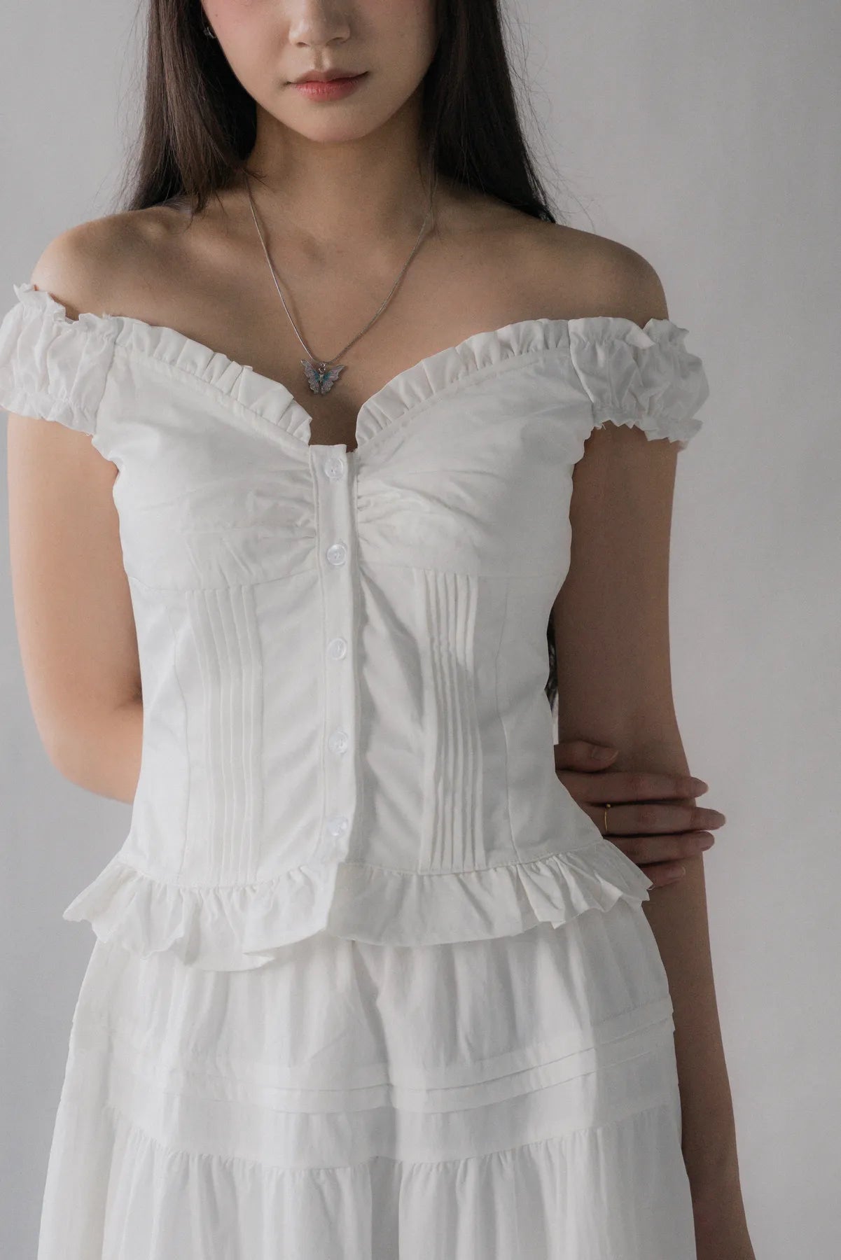 Georgie Pintuck Ruffle Puffed Sleeve Padded Top