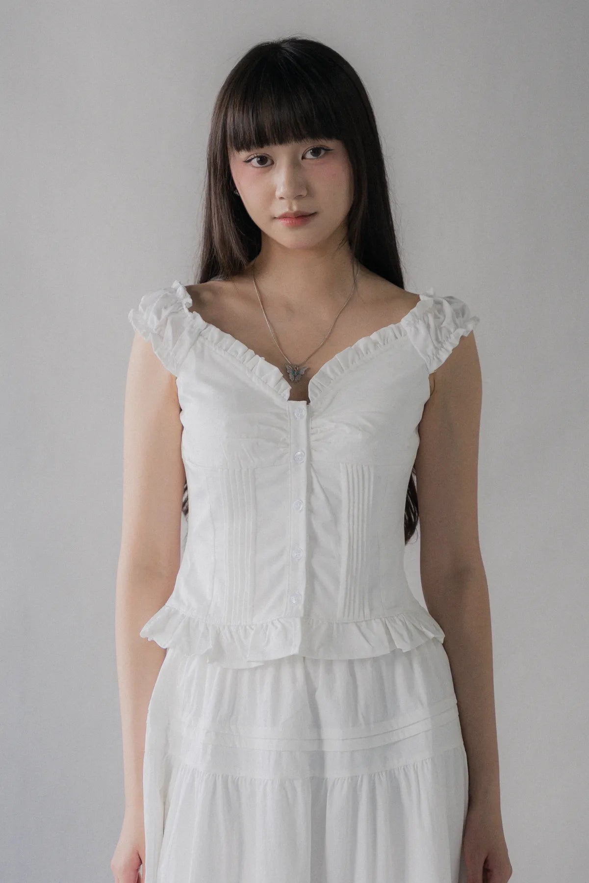 Georgie Pintuck Ruffle Puffed Sleeve Padded Top