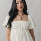 Kiara Flutter Sleeves Padded Babydoll Romper Dress