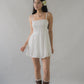 Elysia Ribbon Pintuck Padded Mini Romper Dress